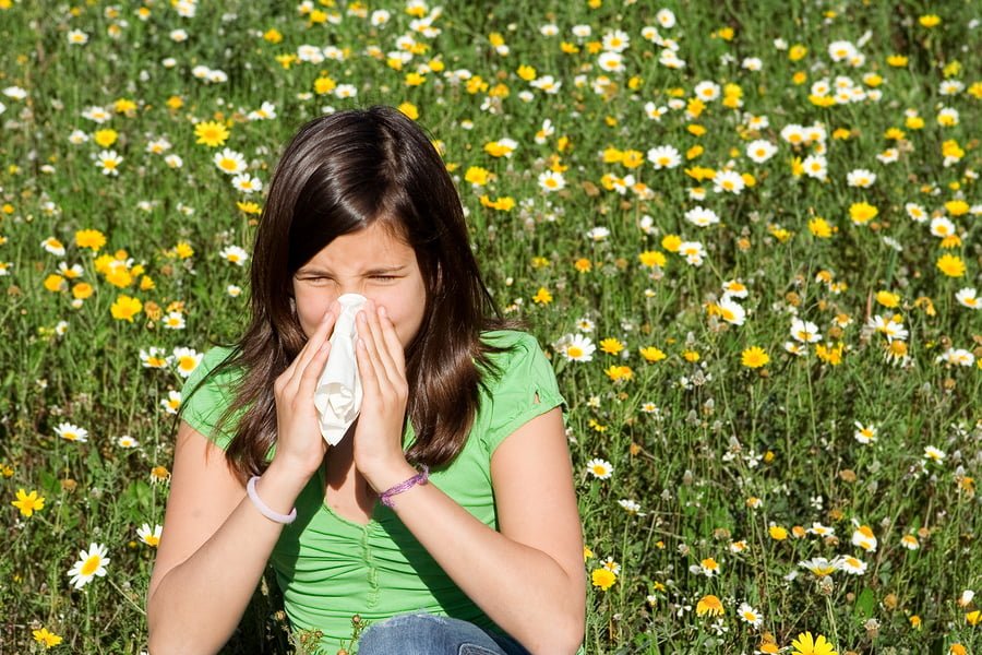 Child With Hayfever Allergy Blowing Nose
