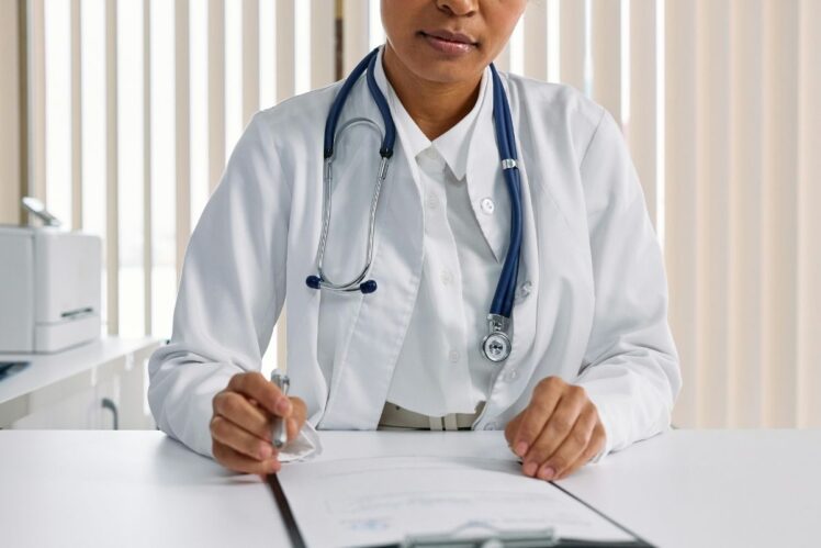 Doctor at their desk.