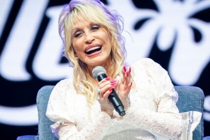 Dolly Parton celebrates Dollywood's first opening day.