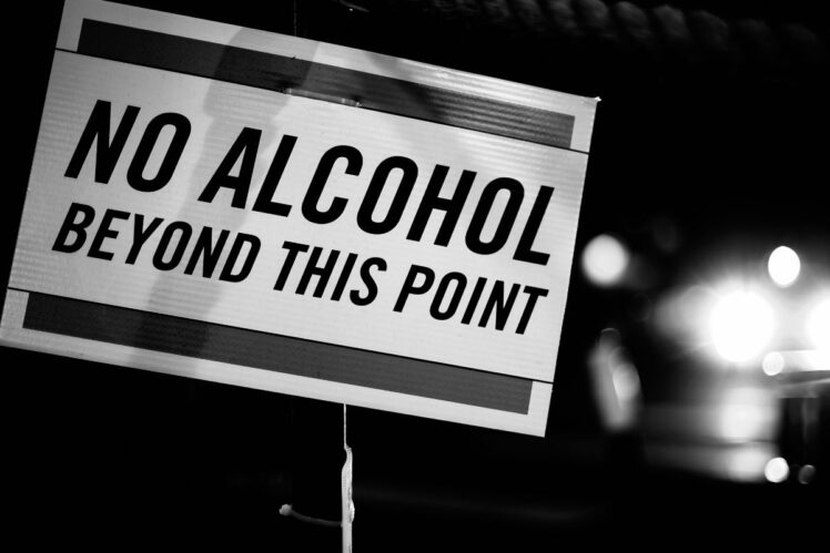 Sign reading no alcohol beyond this point.