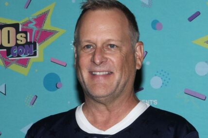 Dave Coulier, who played Uncle Joey on “Full House,” poses on the pink carpet at '90s Con in Daytona Beach, Saturday, Sept. 14, 2024.