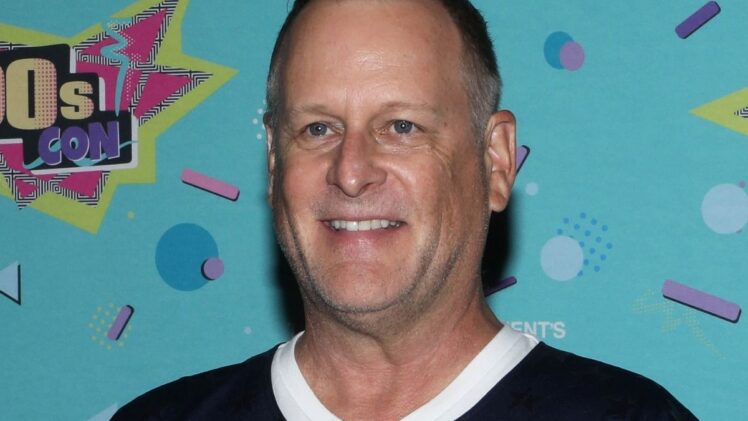 Dave Coulier, who played Uncle Joey on “Full House,” poses on the pink carpet at '90s Con in Daytona Beach, Saturday, Sept. 14, 2024.
