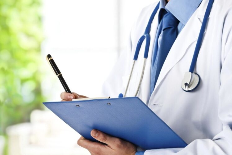 Doctor with checklist.