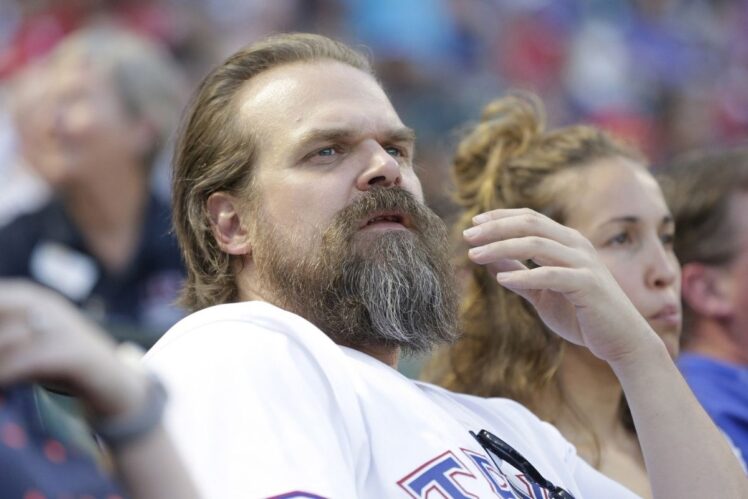 David Harbour watches the game between the Cleveland Indians and the Texas Rangers
