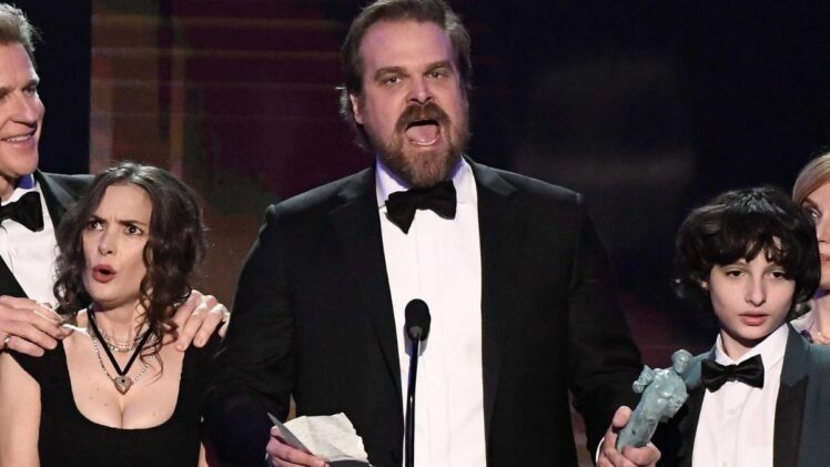 David Harbour speaks as cast members of Stranger Things (Netflix) accept award