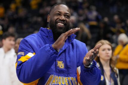 Former Marquette player Dwyane Wade looks on prior to the game against the Butler Bulldogs at Fiserv Forum