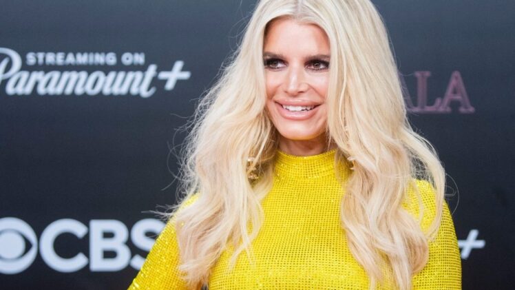Jessica Simpson walks the pink carpet during Dolly Parton's Pet Gala