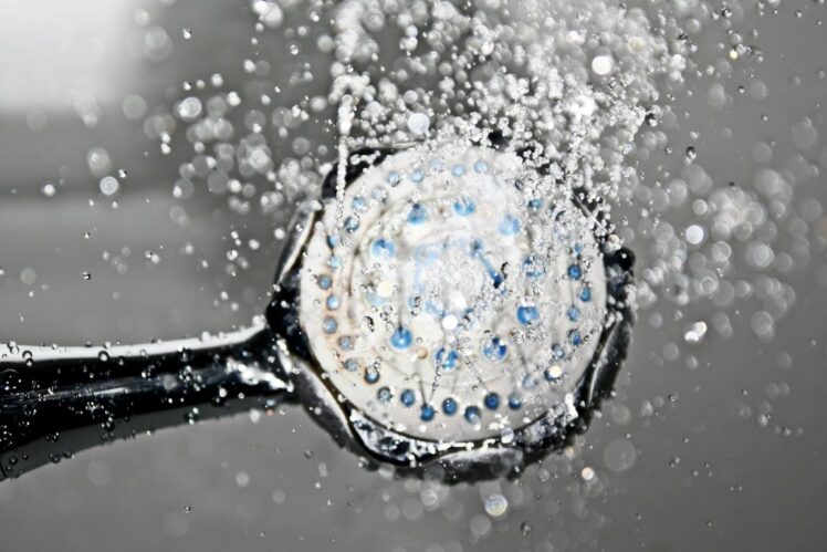 Shower spraying water. 