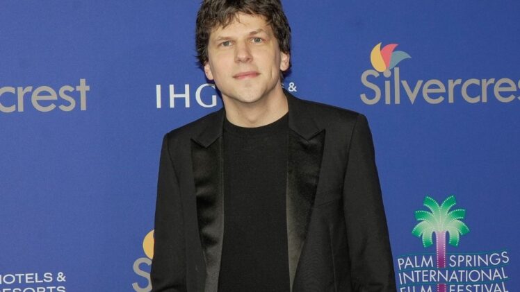 Jesse Eisenberg is photographed on the red carpet during the Palm Springs International Film Awards