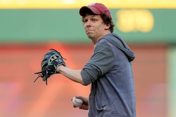 Jesse Eisenberg throws a ceremonial first pitch before the first inning of a MLB interleague game